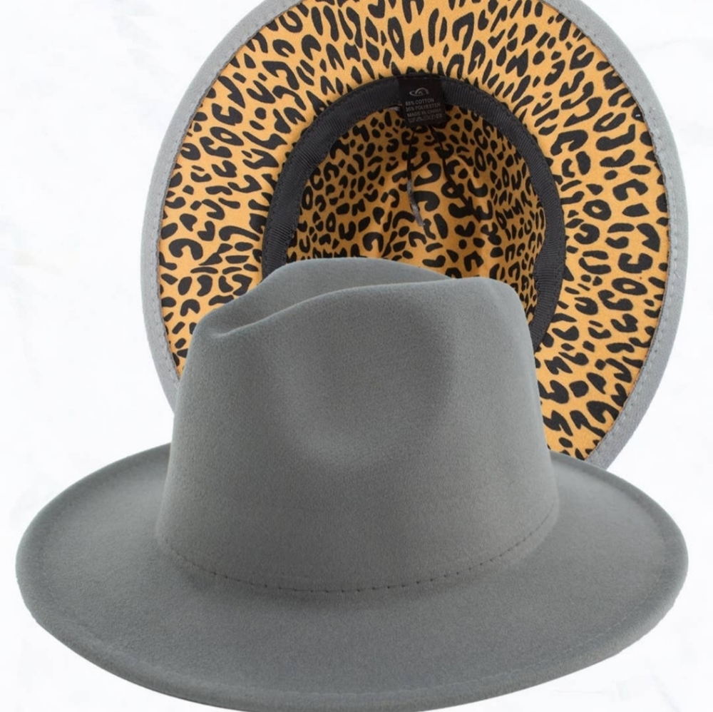 Brand new never worn. Gray Fedora with leopard bottom.